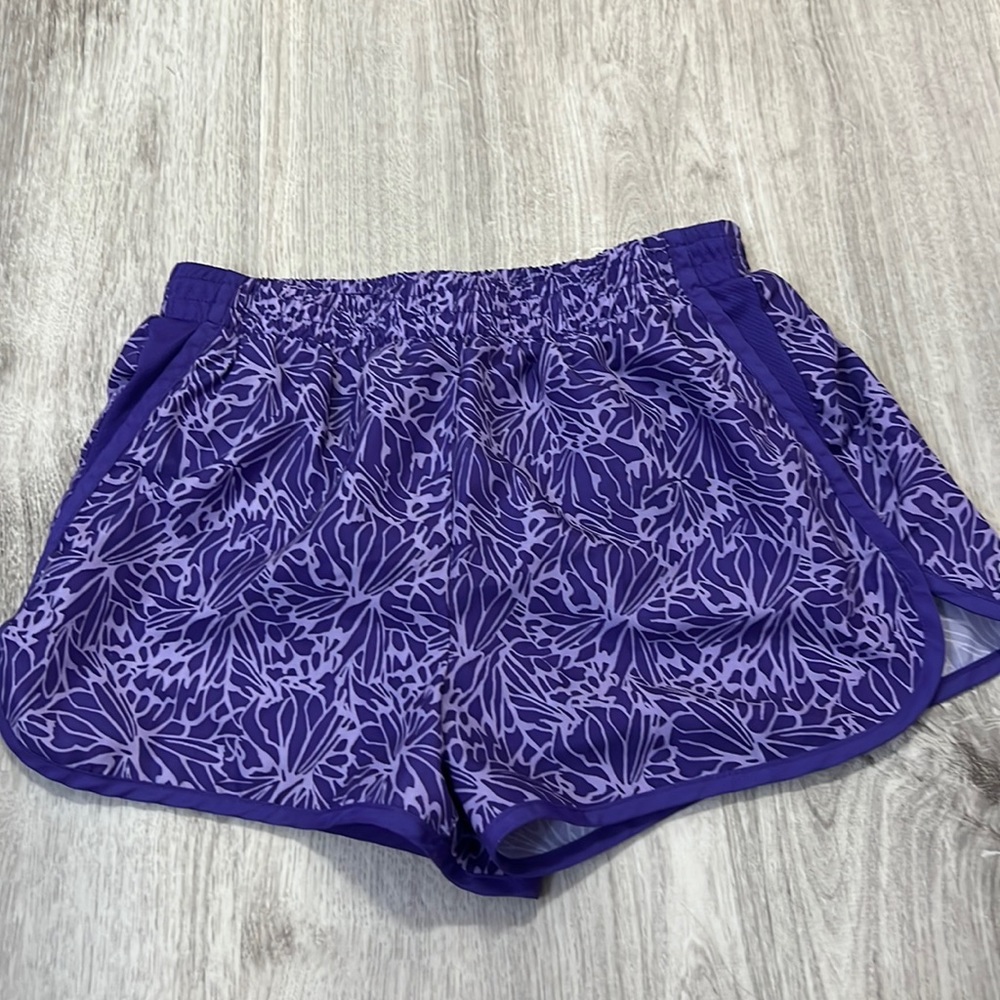 purple floral running shorts in girls L